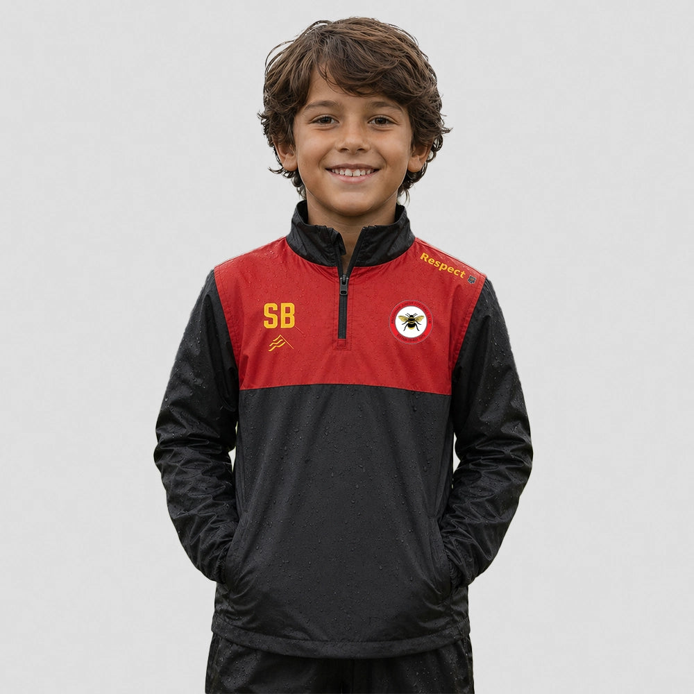 model wearing Frodsham JFC EVO 1/4 Zip Rain Training Top – Junior