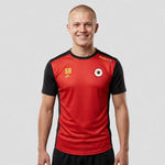 model wearing Frodsham JFC EVO T-Shirt (Black) – Adult