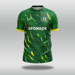 Front view of custom green T20 cricket shirt with yellow and blue accents and a visible sponsor logo