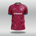 Red custom cricket shirt T20 by Stuart Surridge with blue accents and a visible sponsor logo