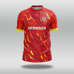 Red custom T20 cricket shirt with colourful patterns and a visible sponsor logo