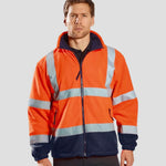 Model wearing the Hi-Vis Contrast Fleece F301 in Orange/Navy.