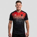 model wearing HFC Custom Technical T-Shirt – Adult