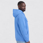 Person wearing a blue AWDis JH001 College Hoodie