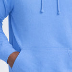 Close-up of a pocket of a blue AWDis JH001 College Hoodie
