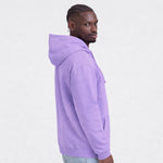 Person wearing a purple AWDIS Just Hoods JH001