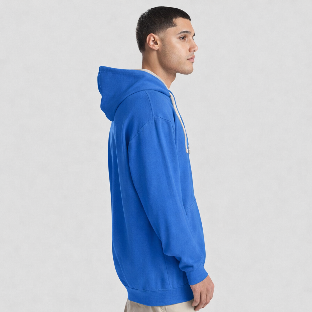 Person wearing a blue AWDis Varsity Hoodie JH003