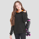 Model wearing the AWDis Kids Varsity Hoodie JH003B in Jet Black / Orange crush