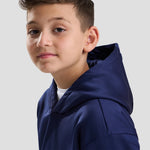 Close-up of Model wearing the AWDis Kids Sports Polyester Hoodie in Oxford Navy