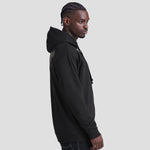 Side view of Model wearing the JH011 AWDis Epic Print Hoodie in Jet Black