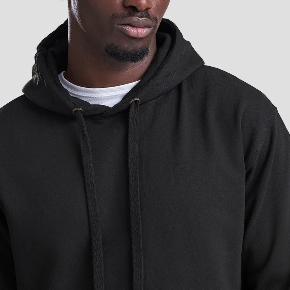 Close-up shot of Model wearing the JH011 AWDis Epic Print Hoodie in Jet Black