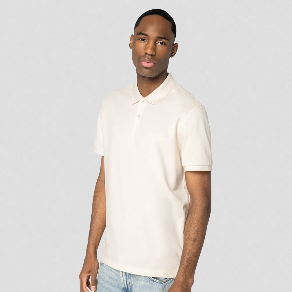 A model wearing a Native Spirit Piqué Polo Shirt