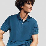 A model wearing a Native Spirit Piqué Polo Shirt