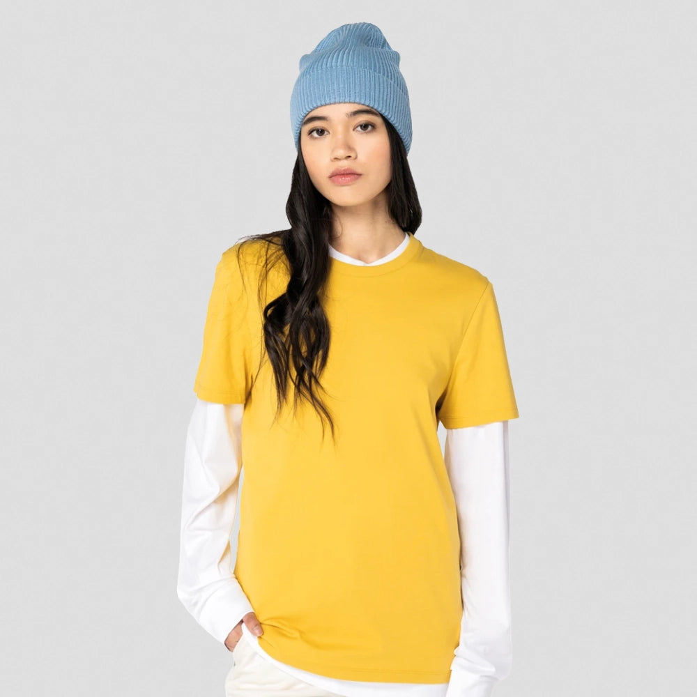 A model wearing a Native Spirit Unisex T-Shirt