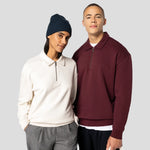 Models wearing a Native Spirit Unisex 1/4 Zip Sweatshirt with Polo Collar