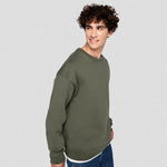 A model wearing a Native Spirit Unisex Oversized Sweatshirt