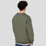 A model wearing a Native Spirit Unisex Oversized Sweatshirt