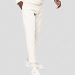 A model wearing a Native Spirit Jog Pants