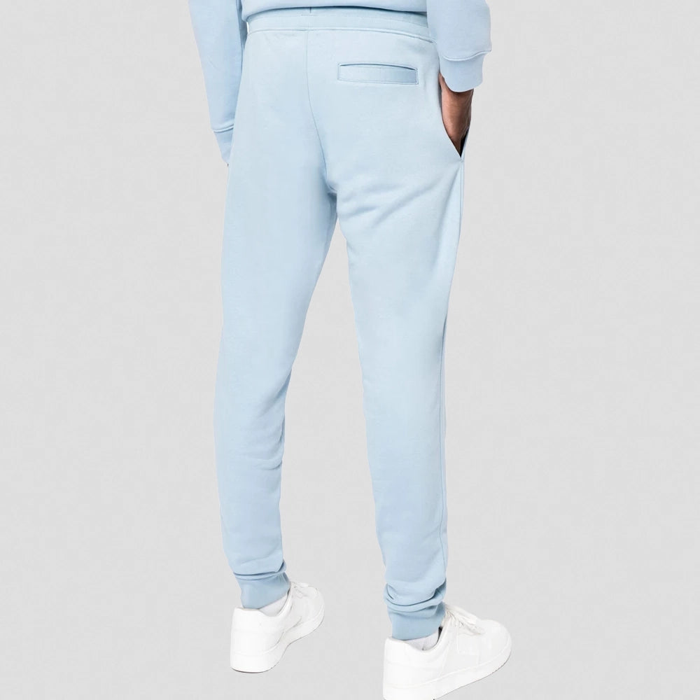 A model wearing a Native Spirit Jog Pants