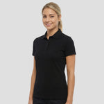 Model wearing the RX101F Pro RTX Ladies Pro Piqué Polo Shirt in Black