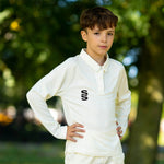 young boy wearing Stuart Surridge Fuse Long Sleeve Cricket Shirt - Juniors