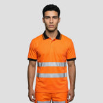 model wearing orange and black Portwest - PW3 Hi-Vis Cotton Comfort Polo Shirt S/S