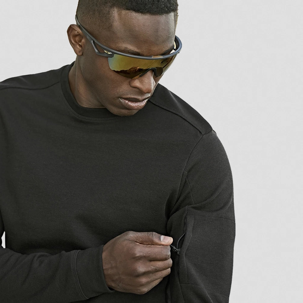 A close up of the pocket of a Tee Jays Athletic Crew Neck Sweatshirt