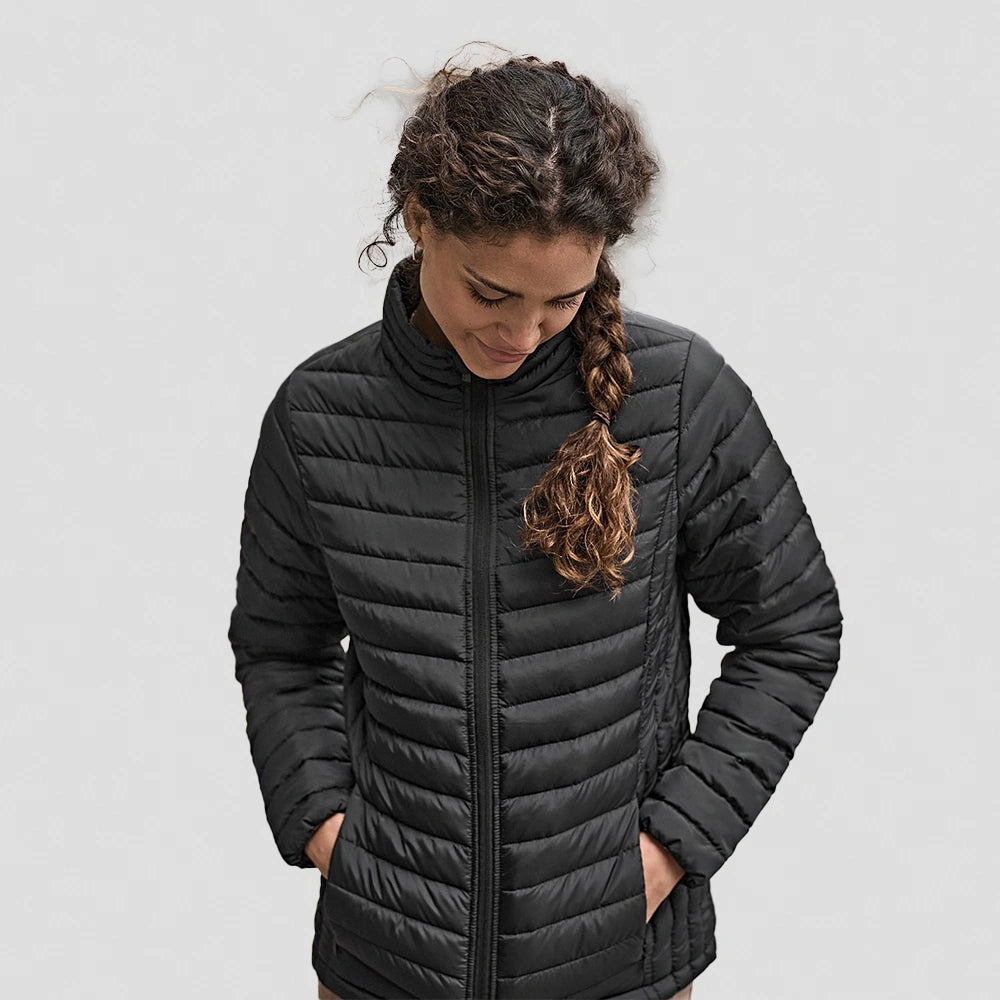 model wearing Tee Jays Ladies Zepelin Padded Jacket in black