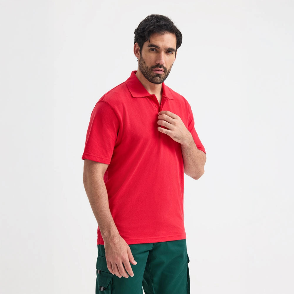 model wearing Active Polo Shirt - Bright Colours UC105 in red