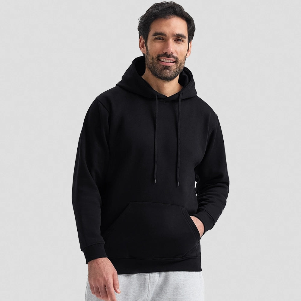 A model wearing Uneek Heavyweight Hooded Sweatshirt UC501