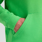 Close-up of the pockets of a bright green Deluxe Hooded Sweatshirt UC509