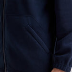 Close up of pocket Uneek Heavyweight Full Zip Fleece Jacket UC601