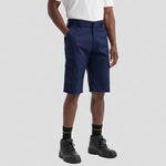 model wearing Uneek Mens Cargo Shorts UC907