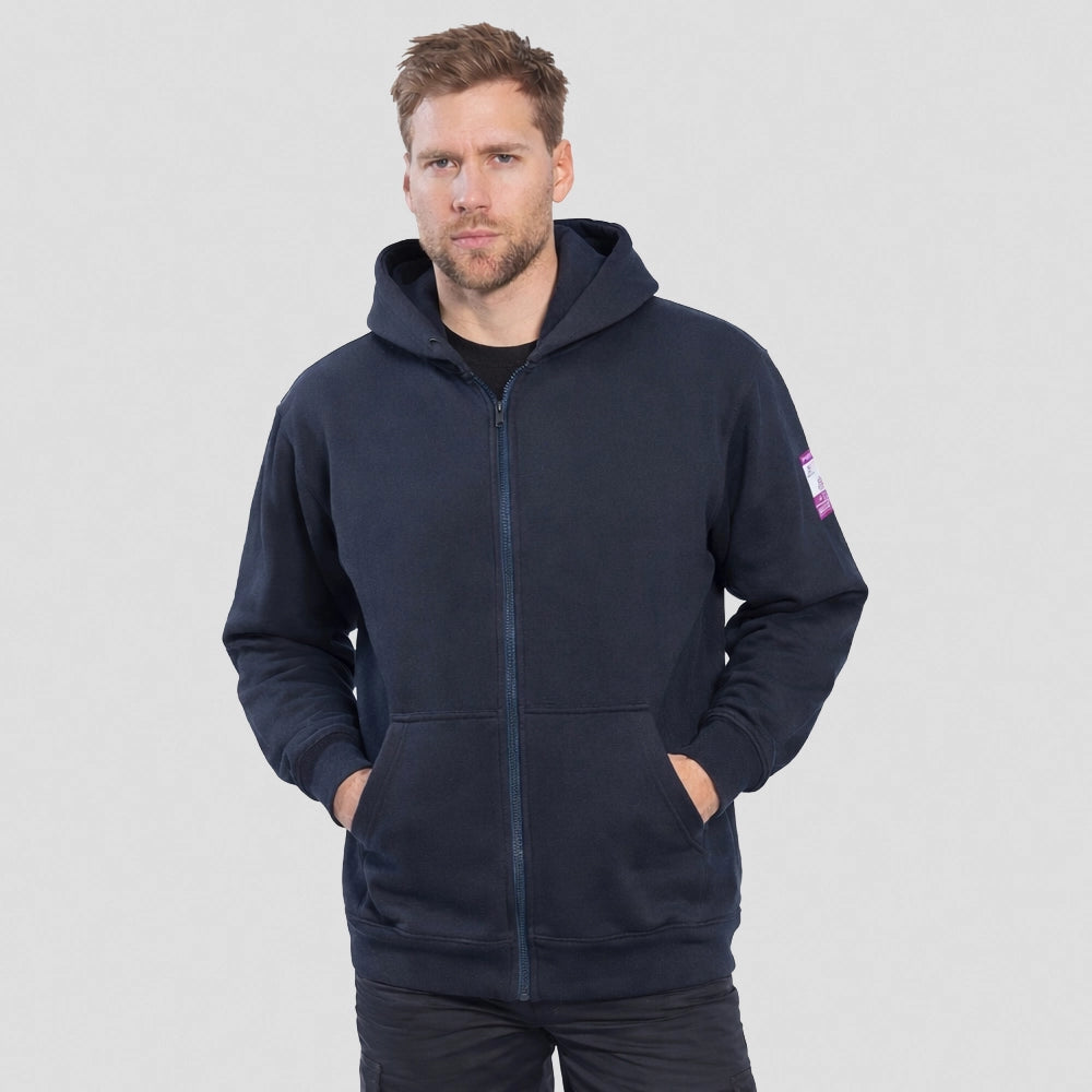 A man wearing a navy blue Portwest - FR Zip Front Hooded Sweatshirt