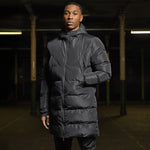 model wearing a long padded bench coat