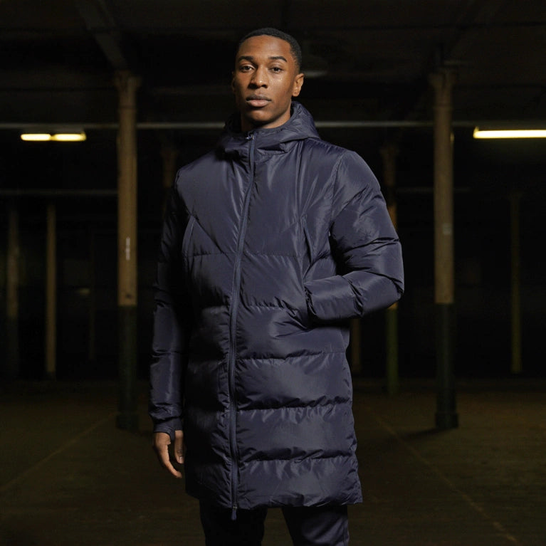 Model wearing a Navy blue Padded Bench Coat