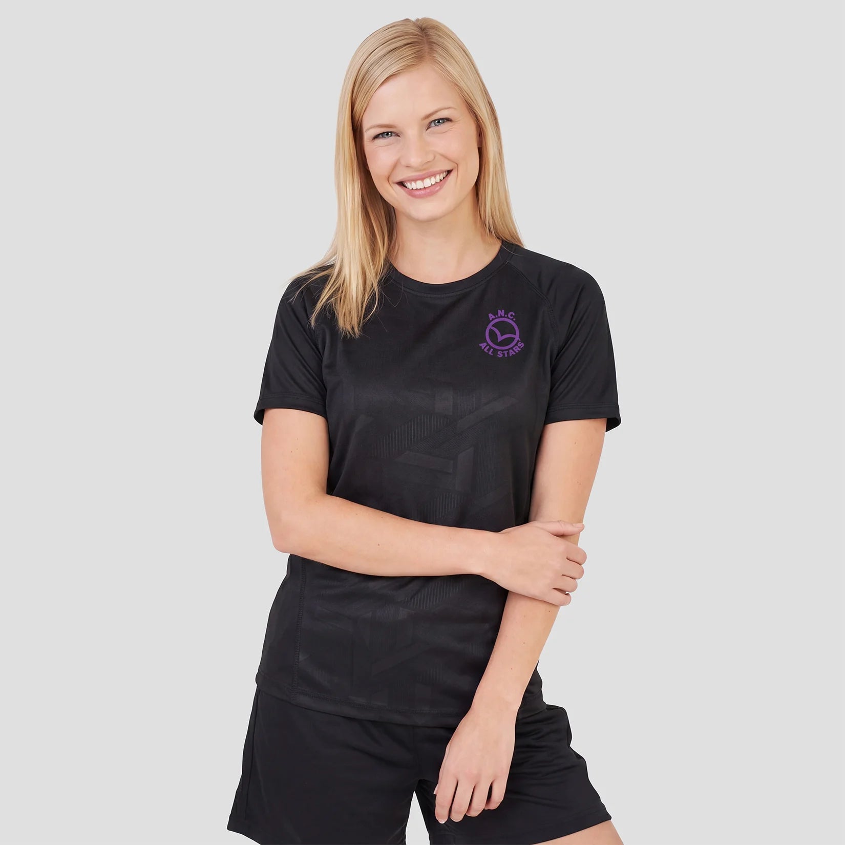 Model wearing the All Stars Netball Training T-Shirt