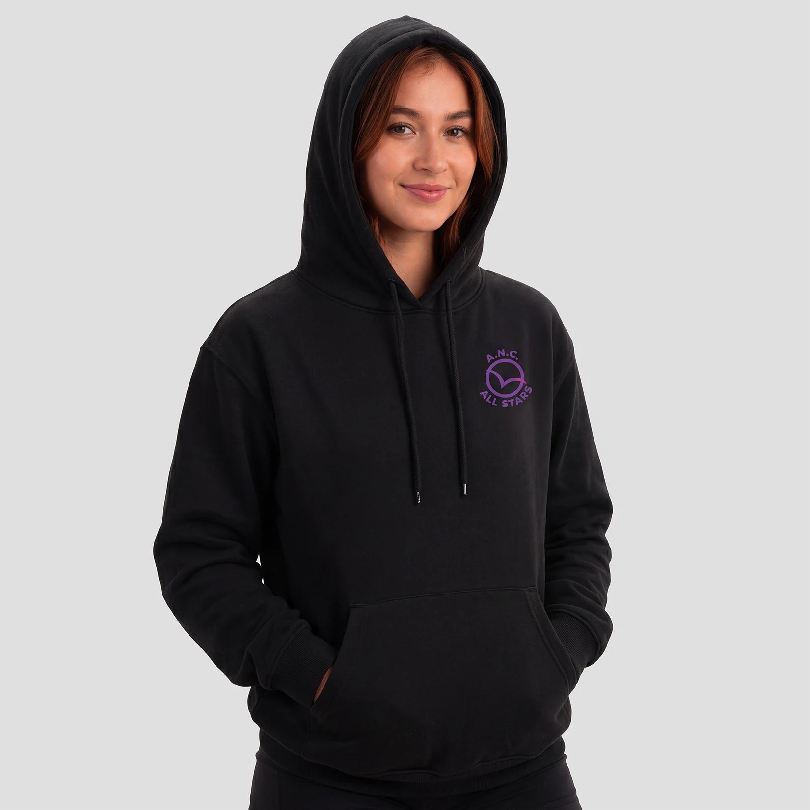 Model wearing the All Stars Netball Club hoodie