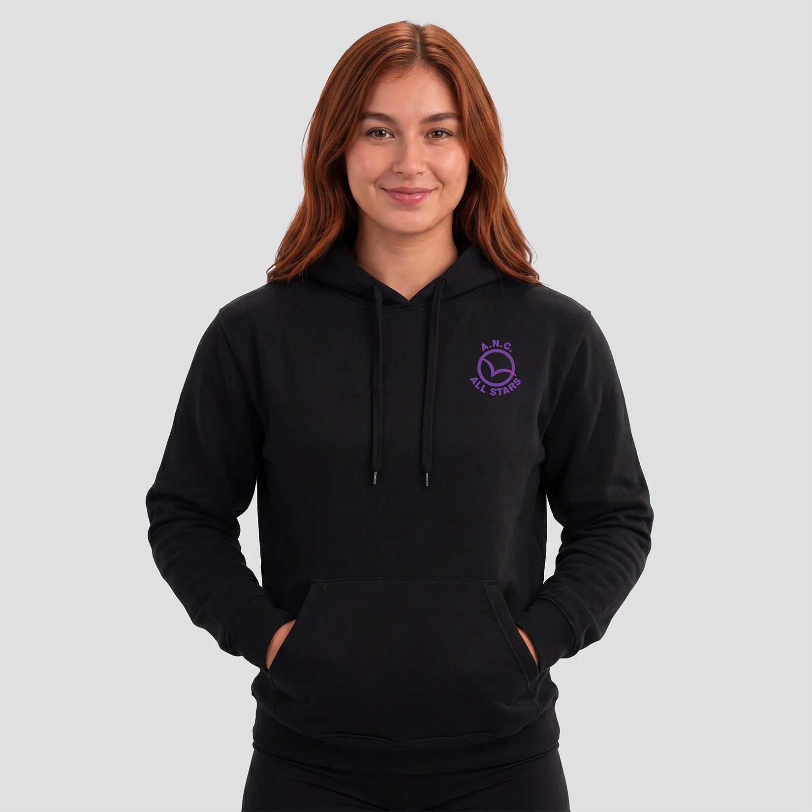 Model wearing the All Stars Netball Club hoodie