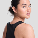 Model wearing the All Stars Netball Training Vest