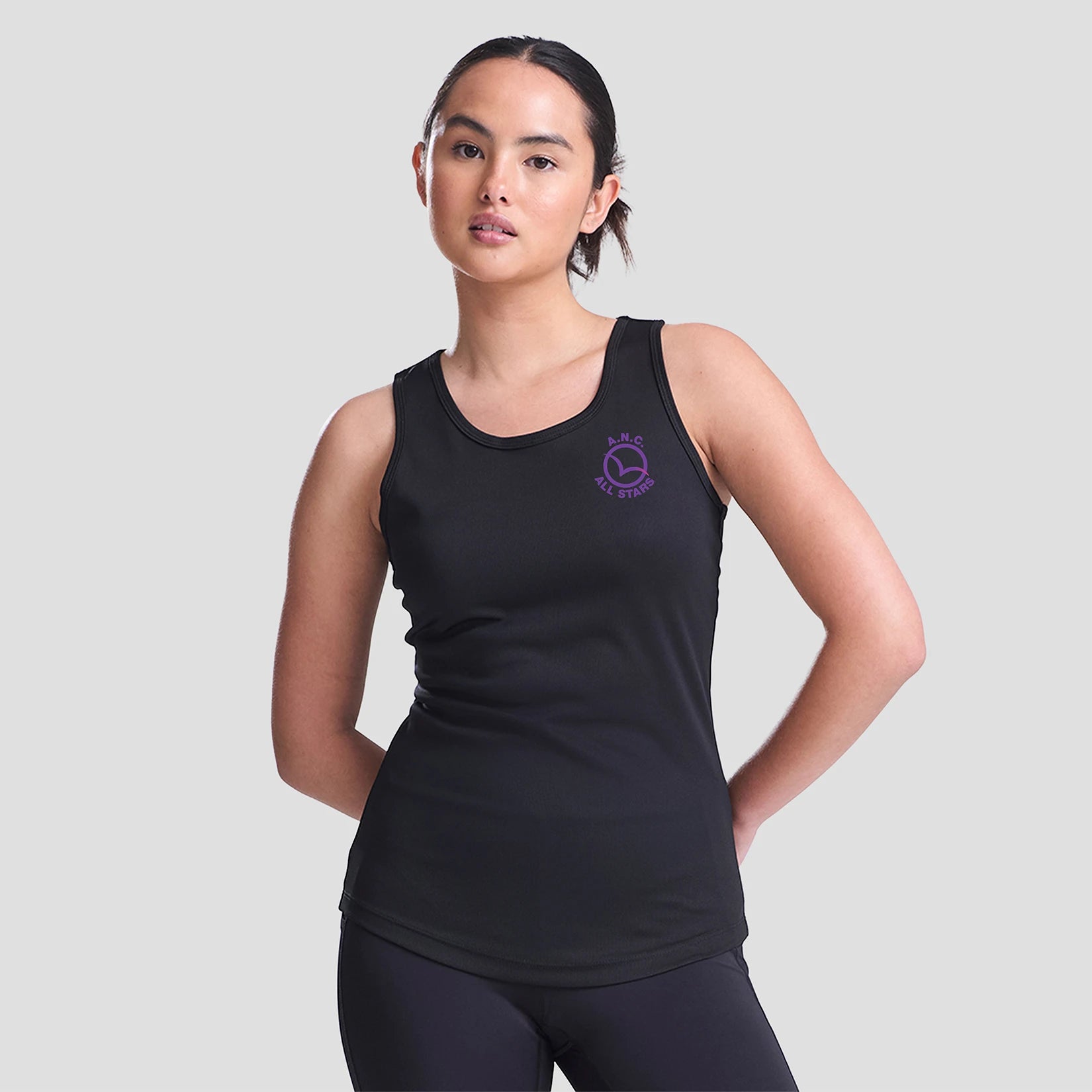 Model wearing the All Stars Netball Training Vest