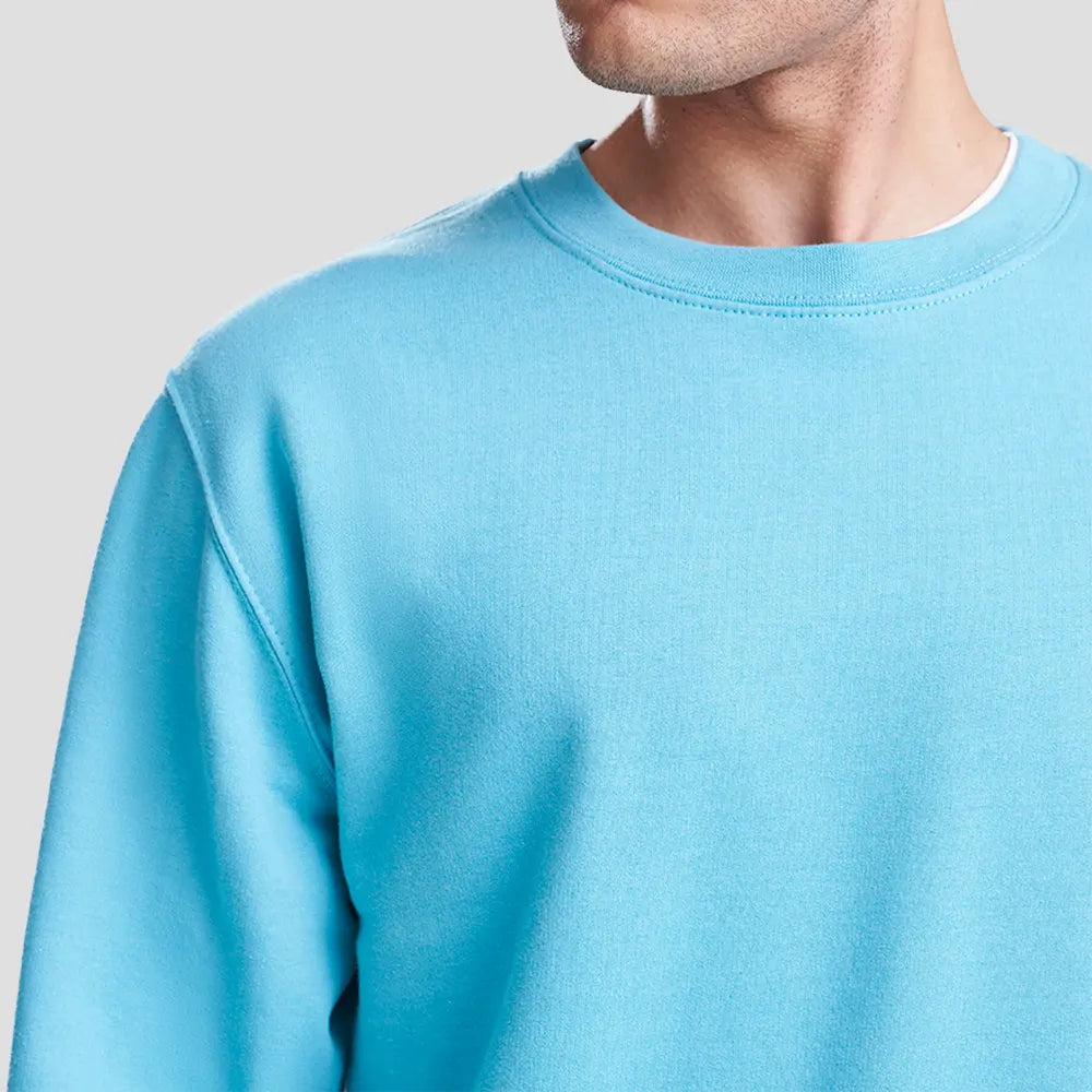 Close-up of Model wearing the JH030 AWDis Sweatshirt in Blue