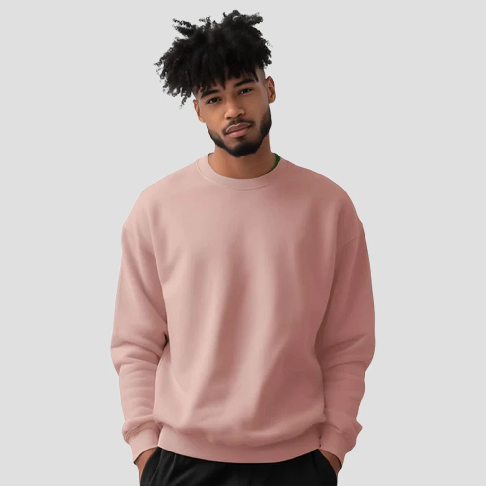 Model wearing the JH030 AWDis Sweatshirt in Dusty Pink