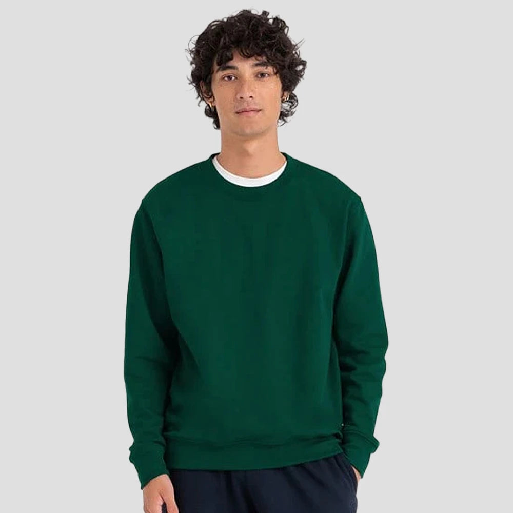 Model wearing the AWDis JH030 Sweatshirt in Bottle Green