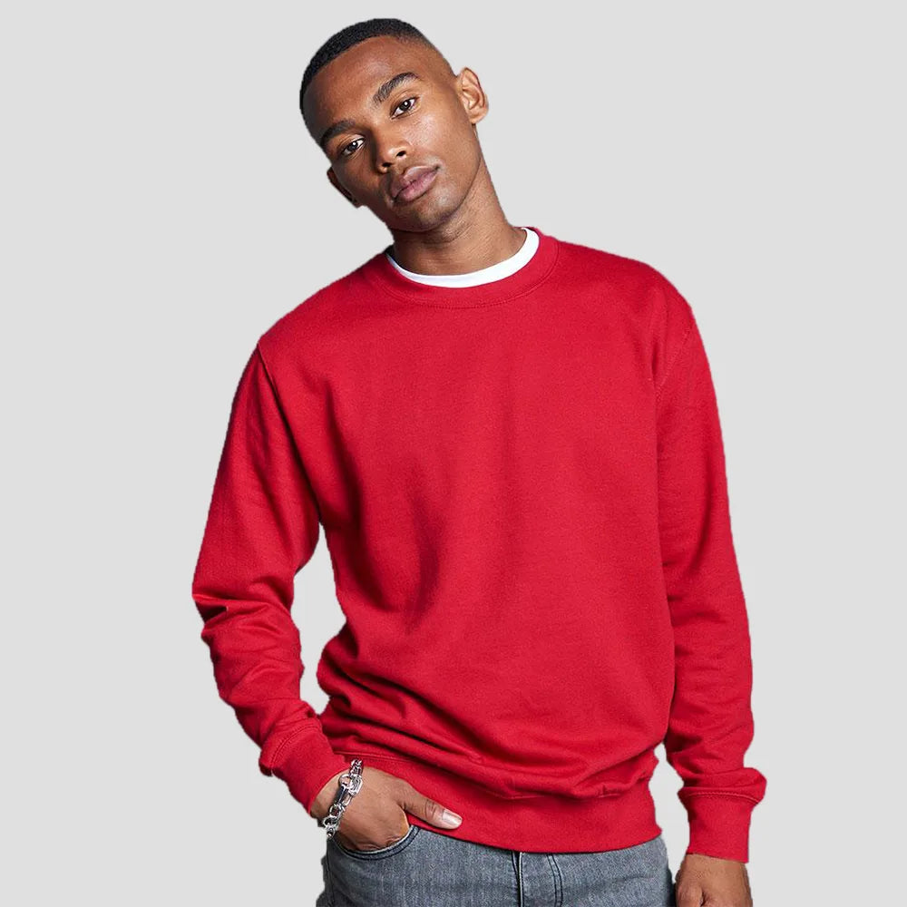 Model wearing the JH030 AWDis Sweatshirt in Fire Red