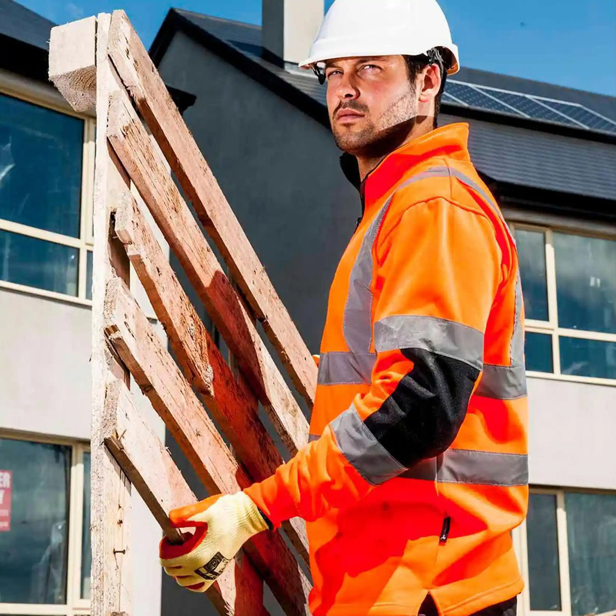 Model wearing the Xenon Hi-Vis Rugby Shirt B308 in Orange.