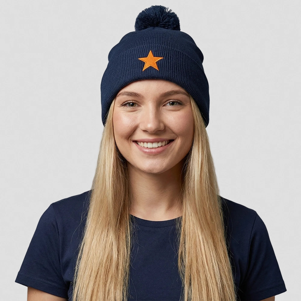 model wearing Cheshire Stars Bobble Hat