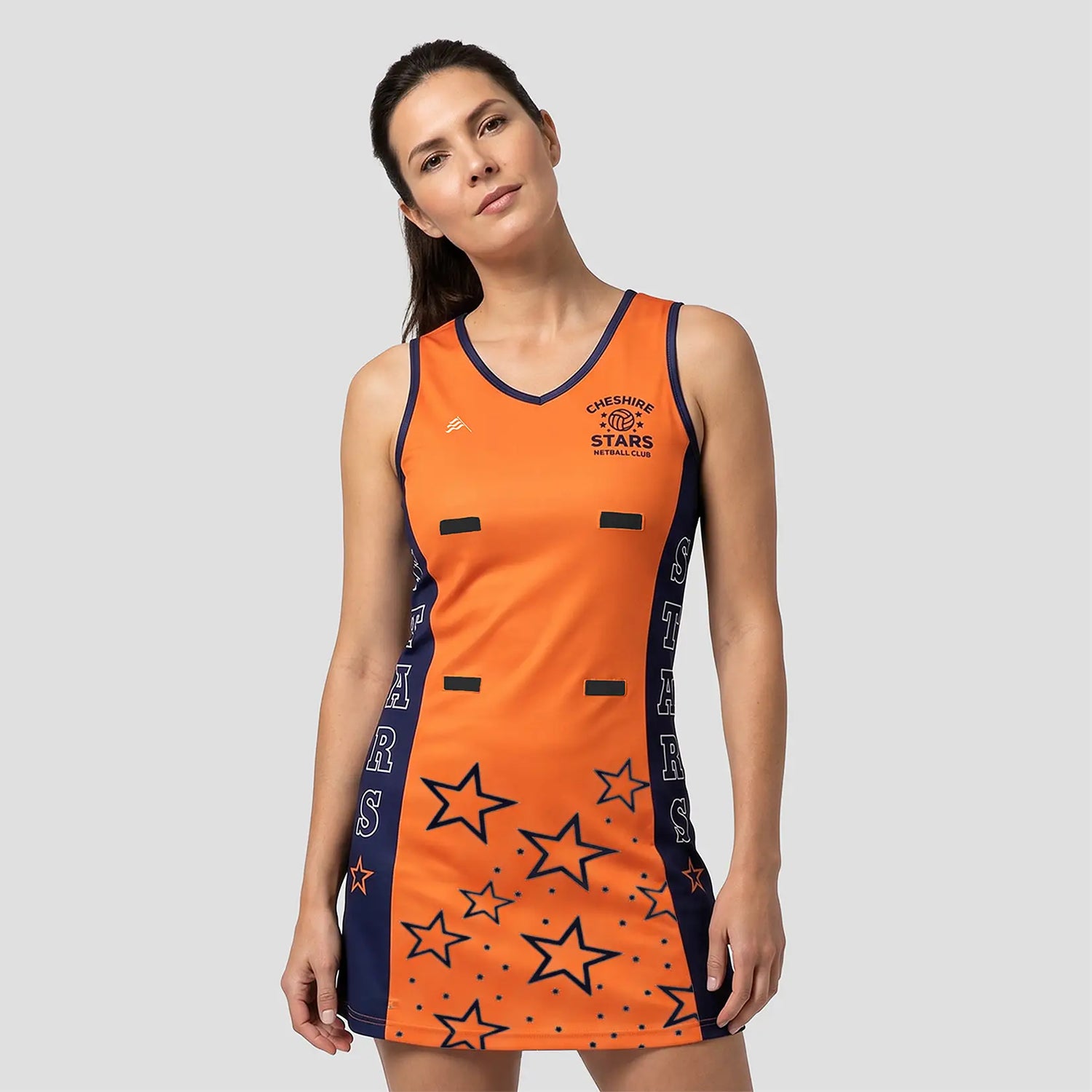 Model wearing Cheshire Stars Netball Dress (Away) – Adult
