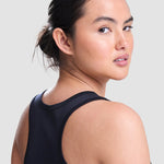 Model wearing the Cheshire Stars Netball Club Ladies Vest (Navy) - Adult