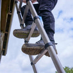 model wearing Cranbrook Black Waterproof ESD S7S on a ladder